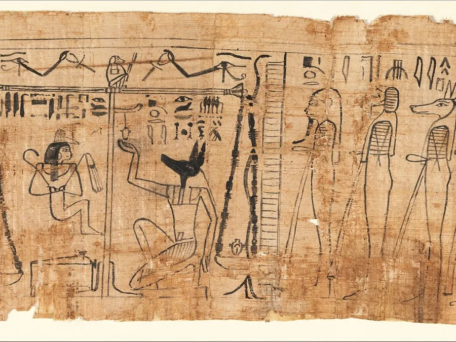 Long Egyptian papyrus panel from the funerary papyrus of Singer Tiye with hieroglyphic text and chapter 125 material.