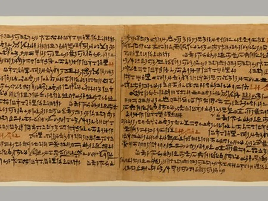 Long Egyptian hieratic papyrus inscribed with Osiris liturgies.