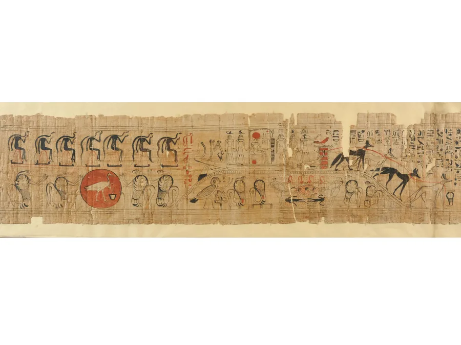 Egyptian funerary papyrus with underworld-book scenes and cursive hieroglyphic text.