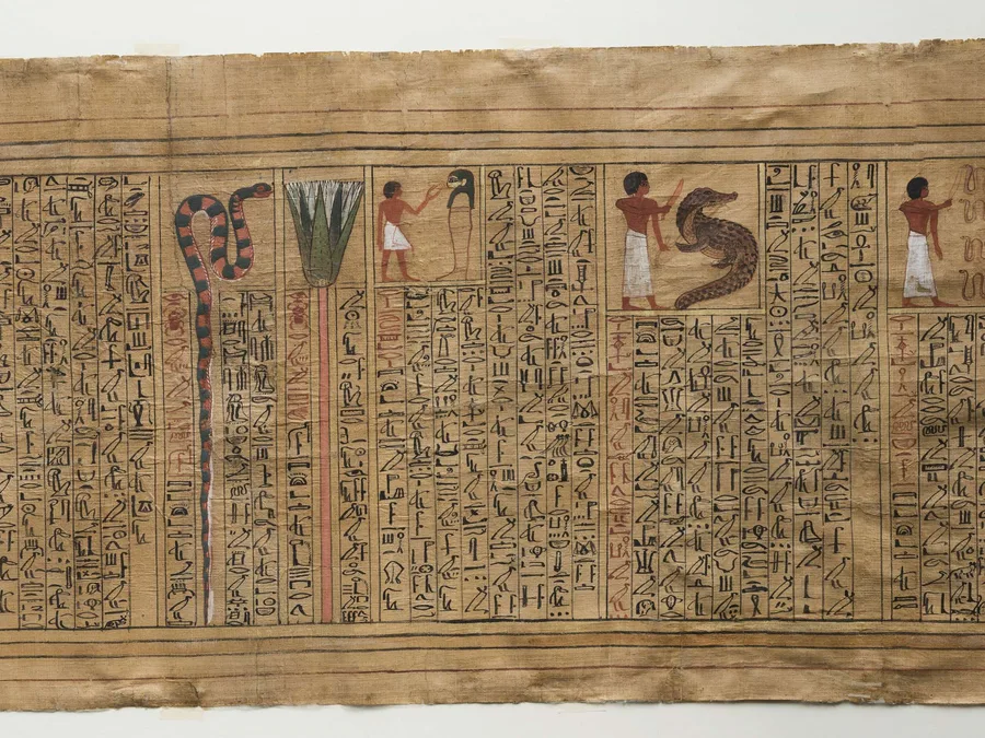 Long Egyptian Book of the Dead papyrus of Kha with cursive hieroglyphic text and colored funerary vignettes.